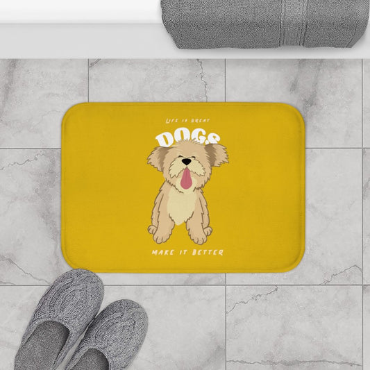 Yellow bath mat with a dog illustration and text on a tiled bathroom floor.