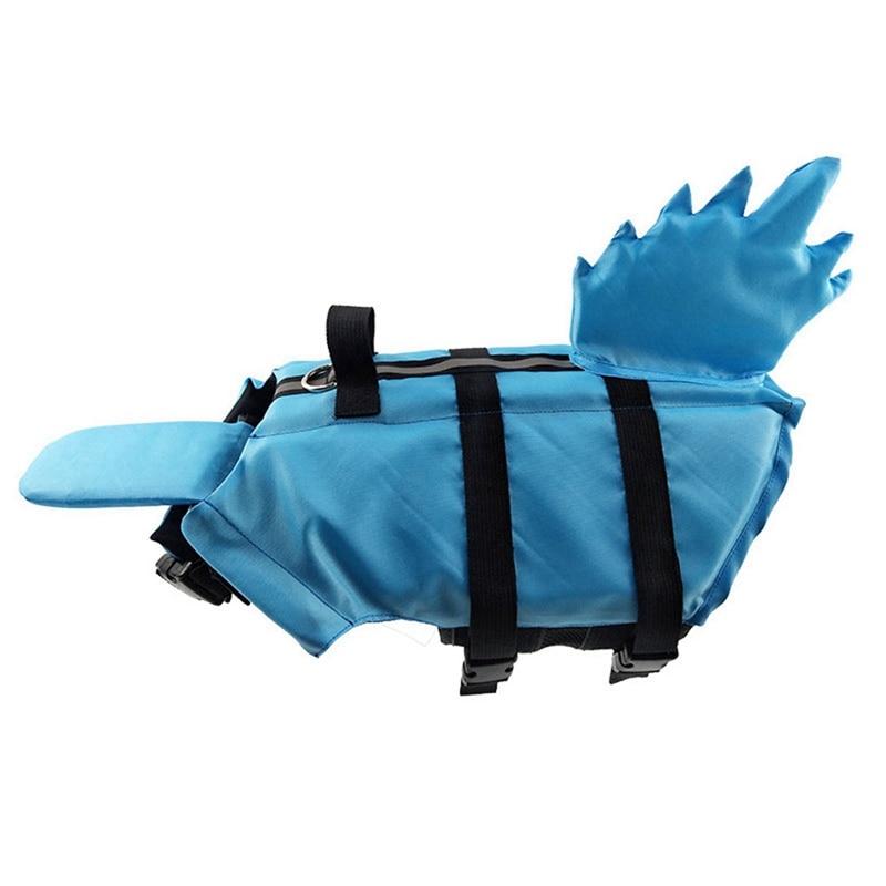 Blue polyester dog life vest with shark-fin back, adjustable straps and quick-release buckles.